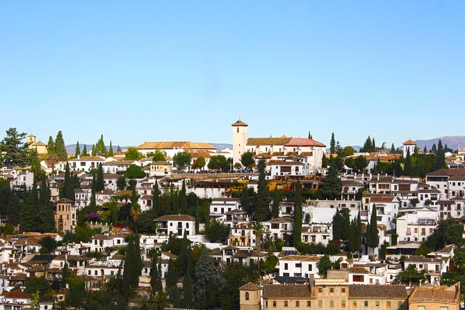 Albayzin and Sacromonte Guided Walking Tour in Granada - Plaza Isabel la Católica and Paseo de los Tristes: the route sets the mood