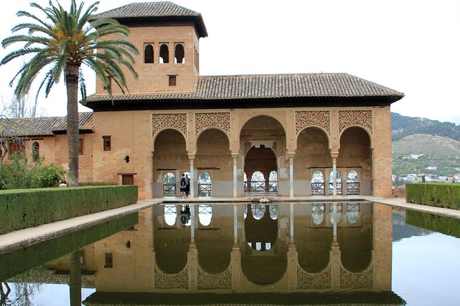 Alhambra Complete: Ticket Skip-the-Line Nasrid Palace and Generalife with Guide - Palacio El Partal: Portico Meaning and Quiet Palace Remains