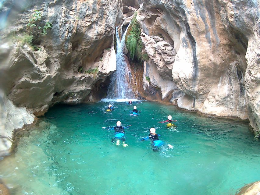 From Granada: Rio Verde Canyoning Tour - The canyon route itself: walk-in, guided moves, and emerald-water payoff