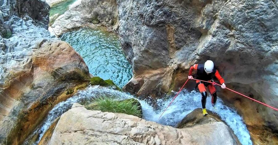 From Granada: Rio Verde Canyoning Tour - Getting your rope skills: safety briefing, helmet, and real rappels