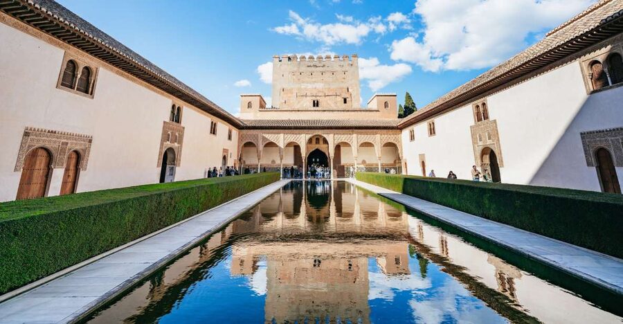 Granada: Alhambra Guided Tour with Nasrid Palaces & Gardens - Alcazaba fortress walls and Torres Bermejas photo views