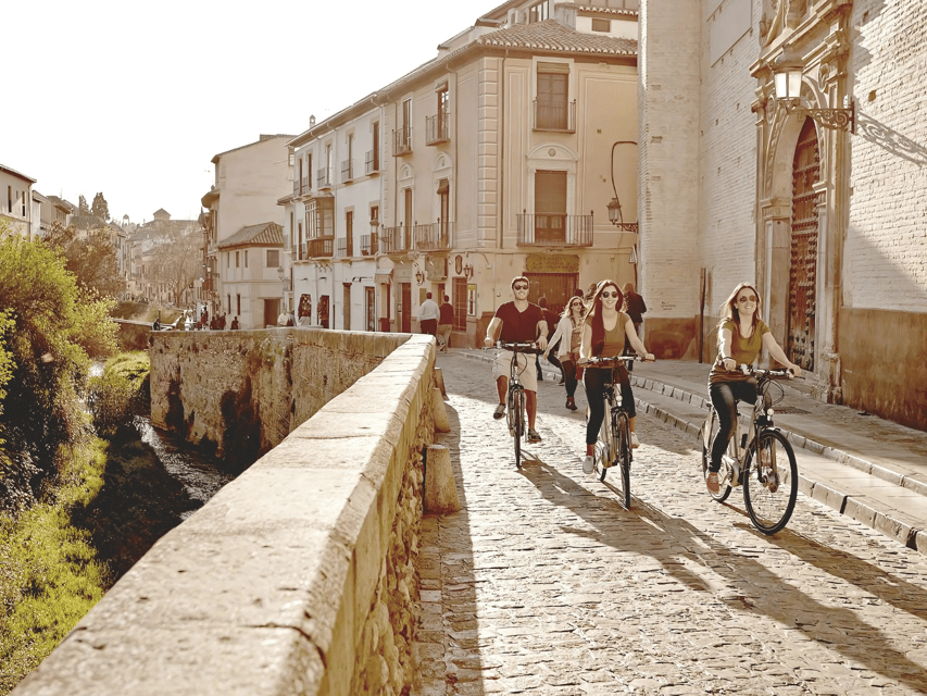 Granada: Electric Bike Tour of Albayzin and Sacromonte - Paseo de los Tristes and the Alhambra View You’ll Actually Use