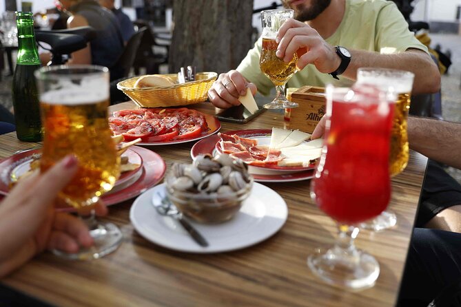 Granada Highlights Tour with Tapas Breaks by Electric Bike - Rolling Out at Pl. de Cuchilleros: Where the Tour Starts