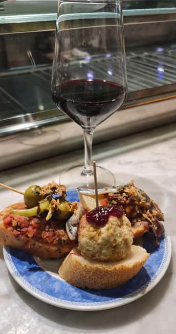Granada: Spanish Tapas Tour with Local Guide. All included. - Tapas Bar One: Granada Wine and Tapas You Pick