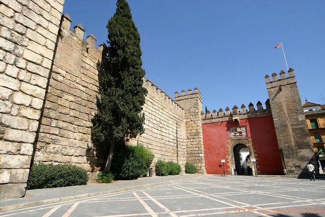 Seville Tour with Alcazar, Cathedral and Giralda from Granada - Giralda Tower: A Minaret-Inspired Icon with Christian Top