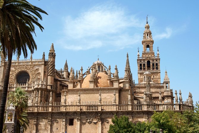 Seville Tour with Alcazar, Cathedral and Giralda from Granada - Entering Seville Cathedral: Gothic Scale and the 40-Minute Reality