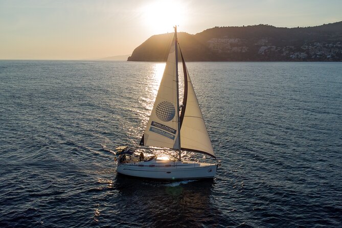 Sunset sailing along the cliffs of Maro- Private - Your 2-hour flow: from boarding to golden hour